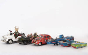 TIN TOYS: Vintage Japanese Daiya "United States Coast Guard" boats (2 variations); Japanese SKK "Nautilus" submarine; Tayo Japanese tinplate VW Beetle; Japanese tinplate Army jeeps (1 battery & 1 friction).