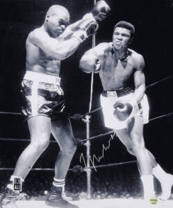 MUHAMMAD ALI, signed photograph from the Muhammad Ali vs Doug Jones fight, March 13th 1963, size 40x51cm. With 'Online Authentics' No.OA-8090282.