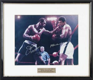 MUHAMMAD ALI v KEN NORTON, both signatures on colour action photograph, window mounted, framed & glazed, overall 73x64cm. With CoA.