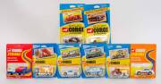 CORGI: Group of Vintage 'Corgi Juniors' Blister Pack Models Including ERF Tipper Truck (48); And, Scammell Cement Mixer (47); And, Porsche Carrera (6). All unopened and mint in packaging. (103 items)