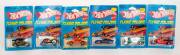 MATTEL: Group of Vintage 1970s Hotwheels 'Flying Colors' Blister Packs Including '56 Hi-Tail Hauler (9647); And, Hot Bird (2014); And, T-Totaller (9648). Most mint, all on original cardboard cards. (76 items)