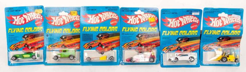 MATTEL: Group of Vintage 1970-80s Hotwheels 'Flying Colors' Blister Packs Including Odd Rod (9642); And, Bubble Gunner (2511); And, CAT Wheel Loader (1173). Most mint, all on original cardboard cards. (77 items)