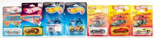 MATTEL: Group of Hotwheels 1980s Including 'Hot Ones' Torino Tornado (9533); And, 'Ultra Hots' (9537); And, 'Hot Ones' 1982 Supra (3925); And, 'Crack-Ups' Top Bopper (7582). All mint and unopened on original cardboard cards. (18 items)