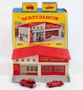 MATCHBOX: Vintage 1960s Lesney Era Fire Related Models Including Fire Station With Red Roof (MF1); And, Fire Truck (9); And, Fire Chief's Car (59). Fire Station Mint in original cardboard packaging with very slight damage to the box and fire truck and car