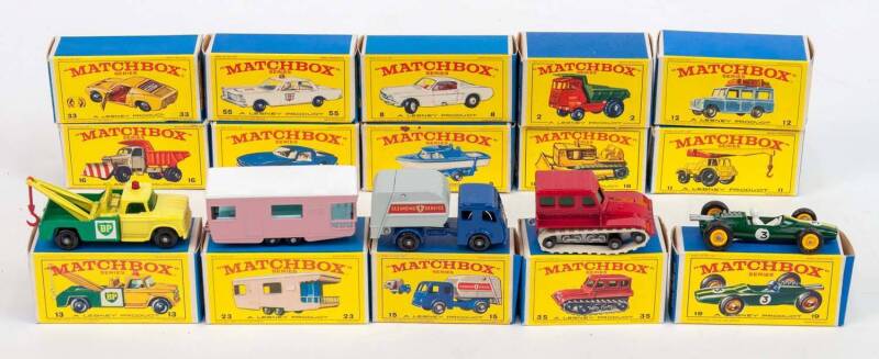 MATCHBOX: Group of 1960s Lesney Era 1-75 E Style Model Cars Including Dodge Wreck Truck (13); And, Trailer Caravan (23); And, Snow Trac (35). Most mint and all in original cardboard packaging. (91 items)