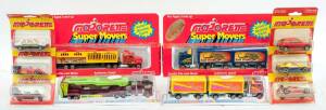 MAJORETE: Group of Model Cars and Trucks Including Magic Circus Super Movers Semi-Circus Trailer (611); And, Road Dragon Super Movers Semi 2 Containers. All mint in original plastic packaging (63 items)