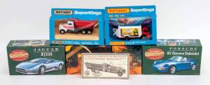 MATCHBOX: Group of Large Model Cars Including Porsche 911 Carrera Cabriolet (LS001); And, 1930 Ahrens-Fox Quad (YSFE01); And, 'Superkings'  Money Box (K88). Most mint, all in original cardboard packaging. (7 items)