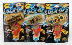 MATCHBOX: Group of Blister Pack 'Lock-Ups' Model Cars Including Police (84010); And, Mustang 5.0 (84010); And, Datsun 280ZX. All mint and unopened on original cardboard card (12 items)