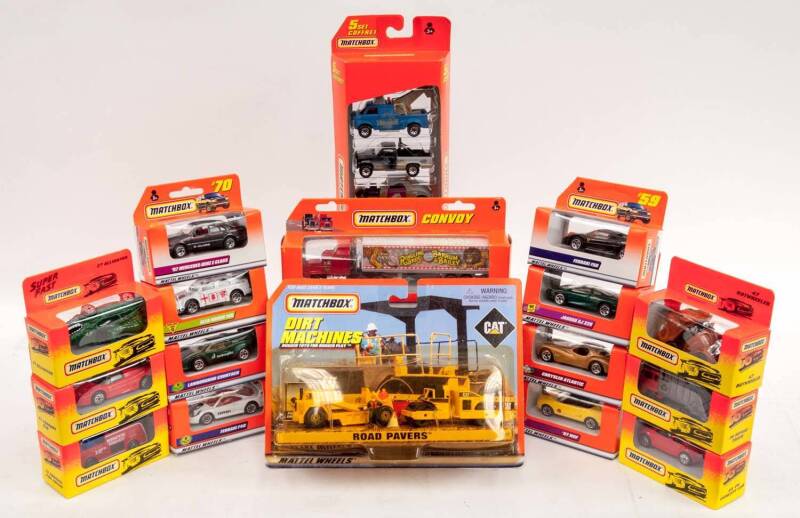 MATCHBOX: Group of Model Cars Including 'Dirt Machines' Road Pavers (32957); And, 'Convoy' Truck and Trailer (32951); And, 5 Set Coffret (32921). Most mint all in original cardboard packaging. (94 items)