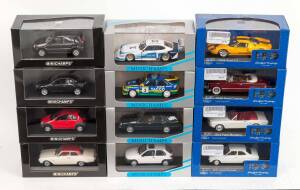 MINICHAMPS: 1:43 Ford Group Including Ford Fiesta (Salsa-Rot Metallic); And, 1999 Ford Focus WRC (Test Car); And, 1914 Model T (Touring Car). All mint in original cardboard packaging. (32 items)