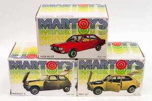 MARTOYS: 1:24 Group of Model Cars Including Renault 5 (103); And, Audi 80 GT (106); And, Fiat 127 (105). All cars mint, all in original cardboard packaging with slight damage to some of the boxes. (3 items)