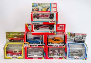 POLISTIL: 1:25 and 1:22 Group of Model Cars Including Orange Fiat Ritmo 65CL (S679); And, Lancia Stratos Pirelli (S714); And, Ferrari 312 T5 (FG7). Most mint, all in original cardboard packaging with labels. (16 items) 