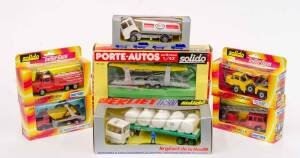 SOLIDO: Group of Model Cars and Trucks Including Berliet TR300 (317); And, Camion Citerne Saviem (319 Esso); And, Porte-autos (321). All mint in original cardboard packaging.