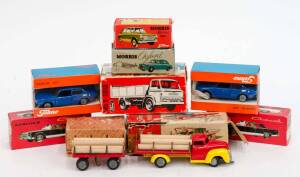 TEKNO: Group of Vintage Model Cars and Trucks Including Dodge Lumber Truck With Accompanying Lumber Truck Trailer (741 & 742); And, Morris Marina 1100 (831); And, Ford D Truck (914). All models mint with slight damage to some of the boxes (9 items)