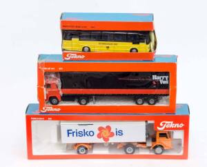 TEKNO: Vintage Group of Trucks and Busses Including Scania CR 76 (851); And, Mercedes Benz 0302 (950); And, Ford D 0810 (922). All models mint wih original near mint cardboard packaging. (7 items)