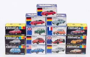 TOMICA: Group of Model Cars Including Porsche 930 Turbo (F1); And, BLMC Mini Cooper S MK-III (F8); And, Mercedes Benz 300SL (F19). All mint in original cardboard packaging. (16 items)