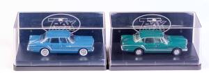 TRAX: 1:43 1962 Chrysler R Series Valiant (TR35F) Deep Blue. And 1962 Chrysler S Series Valiant (TR36E) Deep Green. All mint in original plastic cases with original cardboard boxes and labels. (2 items)
