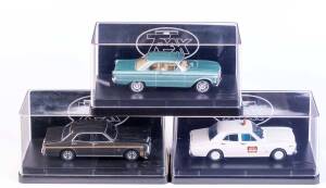 TRAX: 1:43 1965 Ford XP Futura Hardtop (TR51D) Green Velvet Metallic; And 1968 Ford XT Falcon Sedan (TR24H) Regent Taxix - Gold Coast; And 1970 Ford XW Falcon GTHO Phase 11 (TR34E) Reef Green. All mint in original plastic cases with original cardboard box