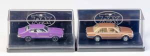 TRAX: 1:43 1970 Holden LC Torana GTR XU-1 (TR33F) Plum Dinger; And 1981 VC Commodore L Sedan (TR61C) Commemorative Gold. All mint in original plastic cases with original cardboard boxes and labels. (2 items)