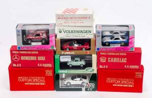 Group of Miscellaneous Model Cars Including K.K. SAKURA: 'World Famous Series' Cadillac (A-3); And, KATO: Fairlady Z (431); And, EBBRO: 'Oldies' Mazda R360 Coupe (151); All mint in original cardboard packaging. (17 items)