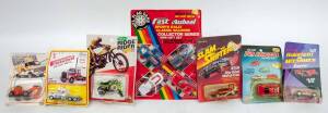 Group of Miscellaneous Model Car Blister Packs Including ZEE: 'Ridge Rider' Kawasaki (M352); And, IDEAL: 'Slam Shifters' Ferrari; And, YAT MING: 'Fast Wheel' Sports Rally Classic Saloons (187B). Most mint, all in original cardboard packaging. (58 items)