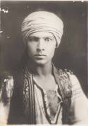 Rudolph Valentino [1895-1926] original signature on albumen photograph of the famous silent-screen actor in costume for his starring role in "The Sheik".