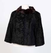 A ladies' fur jacket with mink collar by John Wanamaker from his Rittenhouse Shops range; circa 1955; lined in black satin, with 2 side pockets and 4 black embroidered buttons.&nbsp;