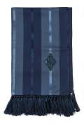 A silk scarf, with stripes in different shades of blue, fringed ends and ornate "JH" monogram incorporated into the fabric. With "A.Sulka & Company" label. 140 x 47cm"A smoking jacket at Sulka may cost $1,500", the fashion-writer Anne-Marie Schiro wrote i