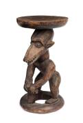 A Carved Figural Pedestal; carved wood and pigment; 49.5 cm high.This table sculpture was presented to Heifetz as a gift by the University of Southern California at the conclusion of one of his teaching engagements.