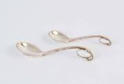 A Georg Jensen silver jam ladle and sugar spoon. (2 items).