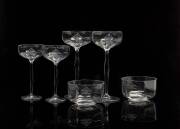 A part suite of Russian crystal bowls and stem ware, circa 1900;&nbsp;each piece finely engraved with the crowned double headed eagle, comprising 10 bowls, 6 white wines, 4 red wines and 2 sherry glasses. (22 pieces) As a child, Heifetz had been invited to per