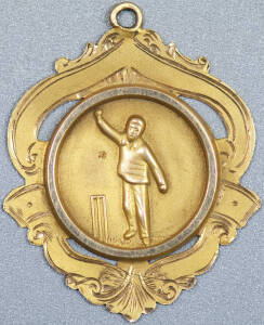 9ct Gold cricket presentation medal inscribed on reverse "B.D.C.C. Bowling Average 5'8 Season 1934/5 F.Stephens", shield shaped with a cartouche of a bowler and stumps. Stamped W9D for William Drummond. 2.6 grams total