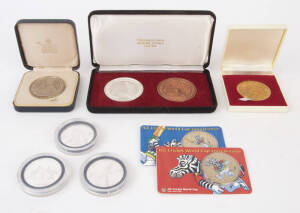 CRICKET MEDALS & COINS: "History of Australian Test Cricket" series I (5); "ICC Cricket World Cup 2003 Medallion"(24); Don Bradman $5 coins (5)and 20 cents (3); "150th Anniversary of Organised Cricket in Tasmania" 2 medal set in box; "Centenary of England