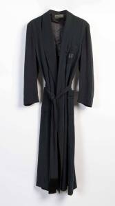 A raw silk bathrobe made in 1960 for Jascha Heifetz with monogrammed "JH" on breast pocket; partial satin lining, matching self belt with tassled ends. Tailored by A. Sulka & Company" with printed label completed in manuscript "11-14'60" and "55195". Heif