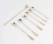 A French silver cocktail spoon by Robert Linzeler Argenson together with a set of six Mexican silver ice tea spoons (7 items). The cocktail spoon from the noted French silversmith was a gift to Heifetz; the set of ice spoons purchased by Heifetz during a 