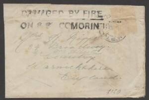 Commonwealth Postal History - 1930 cover to England with stamp washed-off & fibe strike of the huge, unusual & rare 'DAMAGED BY FIRE/ON SS COMORIN' cachet, part of the back missing.