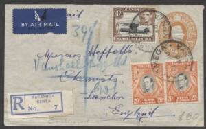 Kenya, Uganda & Tanganyika - 1946 commercial usage of KGVI 20c orange Envelope by air to England with 20c x2 & 1/- tied by 'KAKAMEGA/KENYA' cds, blue/white registration label, 'KISUMU' transit b/s.