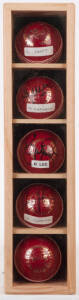 SIGNED CRICKET BALLS, in display case 10x42cm, noted Malcolm Marshall, Brett Lee, Paul Rieffel, Damien Fleming & Colin Croft.