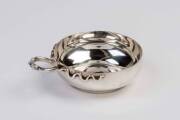 A French silver tastevin with plain bowl and twisted snake handle, maker's mark "SF" - 3