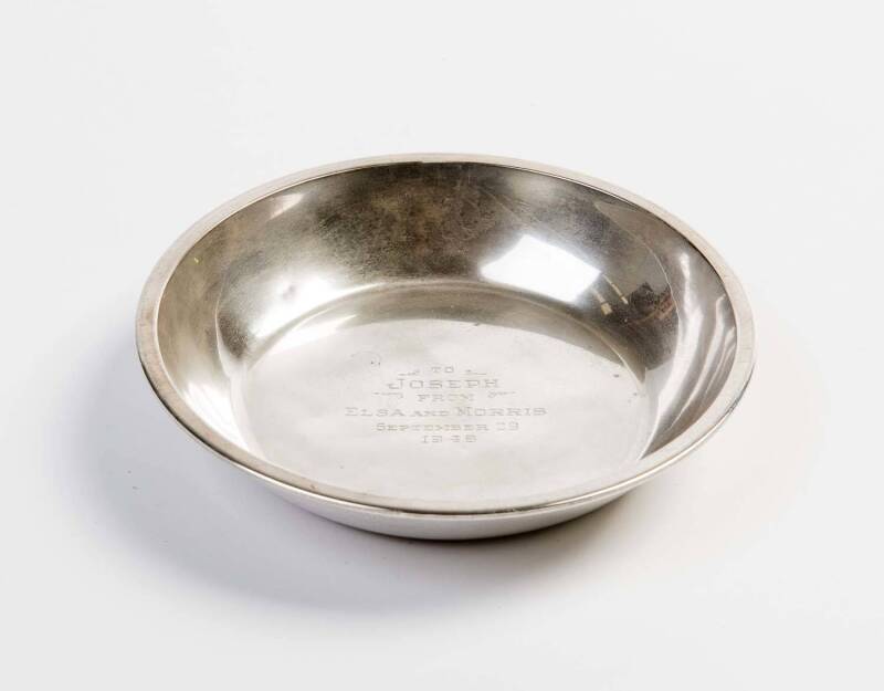 An American silver bowl by Allan Adler engraved "To Joseph from Elsa and Morris, September 29, 1948"; 15.5 cm diameter.A gift to the Heifetz family on the birth of their son, Joseph (aka Jay) from Elsa and Morris Stoloff. Stoloff won three Academy Awards