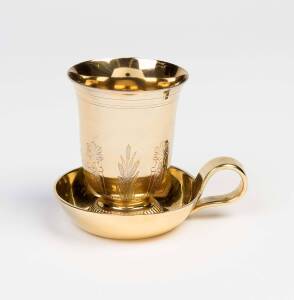 A French silver gilt beaker, the base marked "ODIOT", early 20th century and a gilt tastevin. (2 items).A gift to Heifetz from long-time Russian friends.