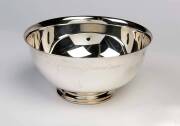 A silver plated bowl with liner engraved 'Paramount Pictures Corporation', mid 20th century;&nbsp;by Reed and Barton;&nbsp;together with a silver plated ice bucket and tongs; thebowl 23cm diameter.&nbsp; - 2