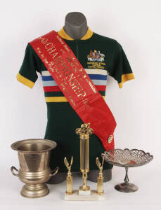 JIM COYLE CYCLING COLLECTION: c1946-88 collection of Australian Veteran Cycling Champion Jim Coyle, noted trophies (7), medals (9), sashes (19), badges (2), cycling shirts (5), scrapbook of press clippings, programmes (33), photographs (153) & ephemera (2