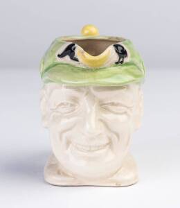 DON BRADMAN SMALL TOBY JUG, made by Marutomo Ware, 1934, 10cm high. Small chip in spout, otherwise good condition.