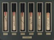 AUSTRALIAN TEST CAPTAINS: Display comprising 6 miniature cricket bats signed by Bill Brown, Arthur Morris, Neil Harvey, Ian Chappell, Greg Chappell & Kim Hughes; framed & glazed, overall 70x55cm.