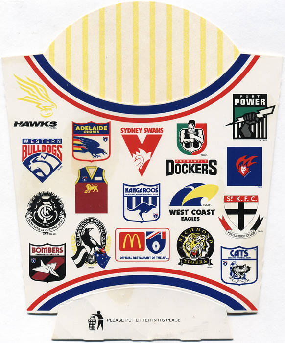 WINE LABELS & WRAPPERS: Binder with Peters "Footy Colours" ice cream wrappers (2); c1980 wine labels featuring premiership teams (89); McDonalds chip buckets with football motifs (9). Fair/VG.