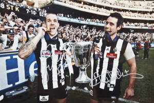 COLLINGWOOD: "Collingwood Football Club, AFL Premiers 2010" display comprsing of a photograph signed by Dane Swan & Alan Didak, window mounted with 8 other Grand Final photographs, framed & glazed, overall 63x111cm. With CoA.