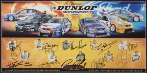 V8 SUPERCARS: "Dunlop Motorsport 2004" print with 10 signatures including Marcos Ambrose, Craig Lowndes, Rick Kelly & Steven Johnson, framed & glazed, overall 58x98cm.