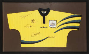 c1997 AUSTRALIAN SOCCEROOS, Australia shirt with 5 signatures including Terry Venables, Matthew Bingley, Craig Foster & Mark Bubic, framed & glazed, overall 121x80cm.