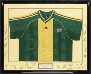 SOCCEROOS v FIFA WORLD STARS, played at official Opening of Stadium Australia (Sydney Olympics Stadium), 12th June 1999, Australian Soccer shirt, window mounted with 20 signatures on the mount including Harry Kewell, Mark Viduka & Stan Lazarides; framed &